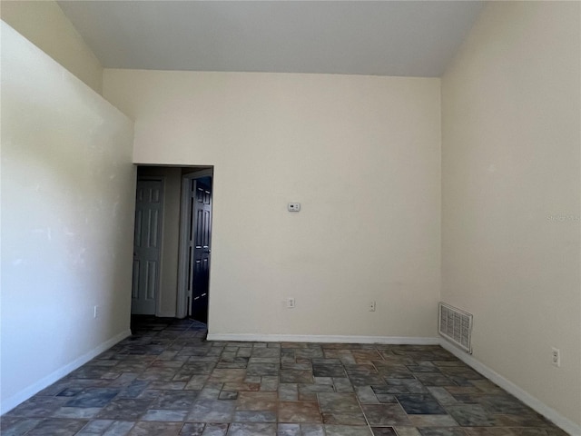 103 Thornbush Pkwy, Davenport, FL 33837 - empty room with stone finish floors