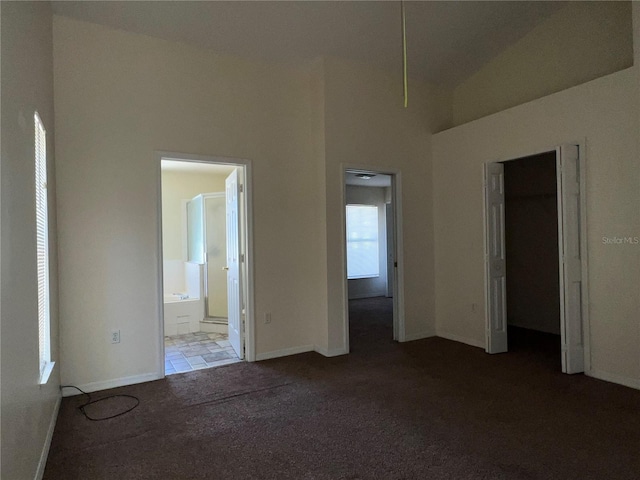 103 Thornbush Pkwy, Davenport, FL 33837 - unfurnished bedroom with carpet floors and ensuite bathroom