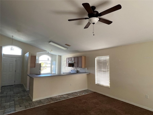 103 Thornbush Pkwy, Davenport, FL 33837 - kitchen with range, ceiling fan, freestanding refrigerator, and a peninsula