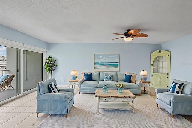 14800 Walsingham Rd Unit 1215, Largo, FL 33774 - living room with a ceiling fan, light tile patterned floors, and a textured ceiling