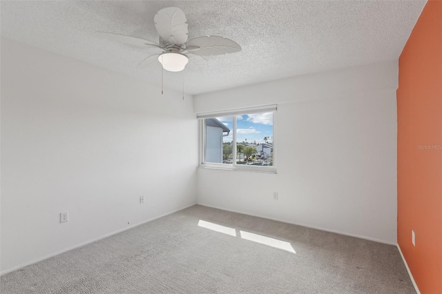14800 Walsingham Rd Unit 1215, Largo, FL 33774 - carpeted spare room with a textured ceiling and a ceiling fan