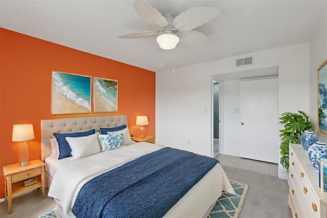 14800 Walsingham Rd Unit 1215, Largo, FL 33774 - bedroom featuring ceiling fan, carpet, and tile patterned flooring