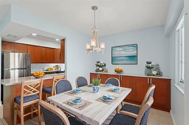 14800 Walsingham Rd Unit 1215, Largo, FL 33774 - dining room with light tile patterned floors, a chandelier, and recessed lighting