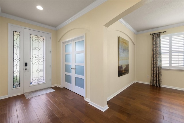 19409 Wingrove Ln, Lutz, FL 33558 - foyer with dark wood-type flooring, ornamental molding, recessed lighting, and french doors