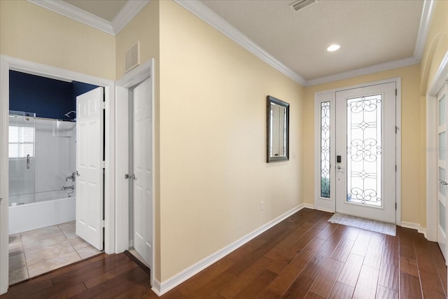 19409 Wingrove Ln, Lutz, FL 33558 - entrance foyer with dark wood-type flooring, ornamental molding, and recessed lighting