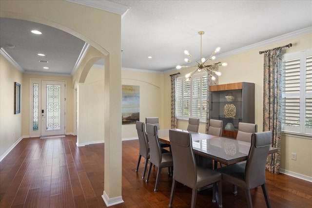 19409 Wingrove Ln, Lutz, FL 33558 - dining space featuring arched walkways, healthy amount of natural light, dark wood-type flooring, ornamental molding, and a chandelier