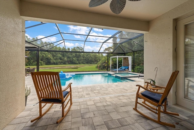 19409 Wingrove Ln, Lutz, FL 33558 - view of swimming pool featuring ceiling fan, a patio, a pool with connected hot tub, and a lanai