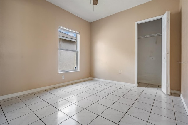 11022 Connacht Way, Tampa, FL 33610 - unfurnished bedroom featuring a closet, light tile patterned floors, and ceiling fan