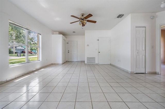 11022 Connacht Way, Tampa, FL 33610 - unfurnished bedroom with light tile patterned floors and ceiling fan