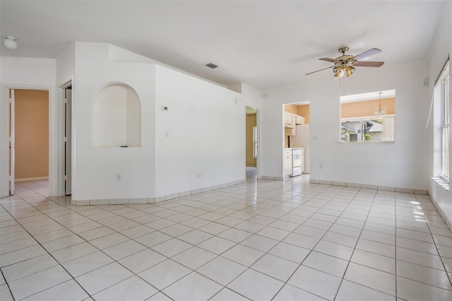 11022 Connacht Way, Tampa, FL 33610 - empty room with a ceiling fan and light tile patterned floors