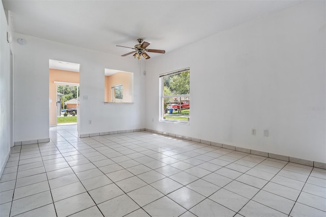 11022 Connacht Way, Tampa, FL 33610 - spare room featuring ceiling fan and light tile patterned floors