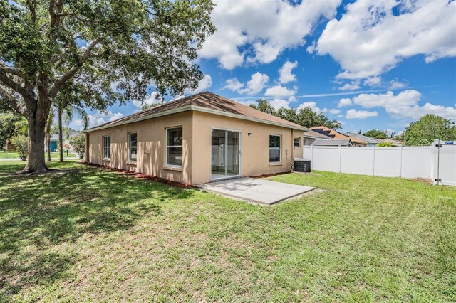 11022 Connacht Way, Tampa, FL 33610 - rear view of property with stucco siding and a patio
