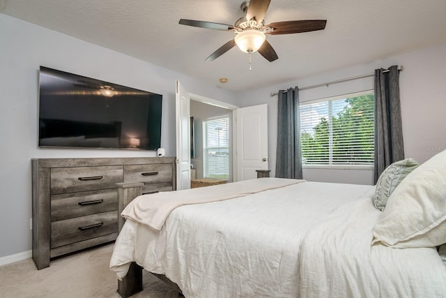 18508 Merseyside Loop, Land O Lakes, FL 34638 - bedroom featuring light colored carpet and ceiling fan