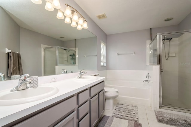18508 Merseyside Loop, Land O Lakes, FL 34638 - bathroom with a shower stall, a garden tub, double vanity, and tile patterned flooring