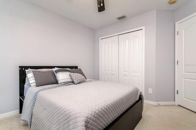 18508 Merseyside Loop, Land O Lakes, FL 34638 - bedroom featuring light colored carpet, a closet, and ceiling fan