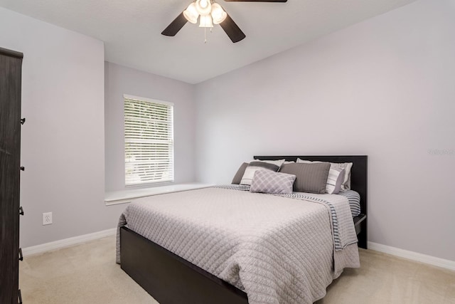 18508 Merseyside Loop, Land O Lakes, FL 34638 - bedroom with light colored carpet and ceiling fan