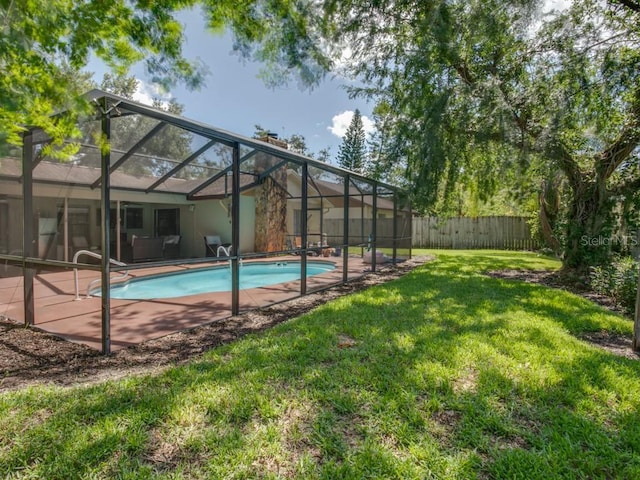 1610 Sanderling Ct, Brandon, FL 33511 - view of swimming pool with a fenced backyard, a patio, and glass enclosure