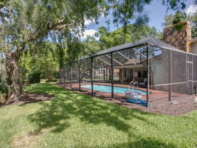 1610 Sanderling Ct, Brandon, FL 33511 - outdoor pool featuring a yard, a lanai, and a patio