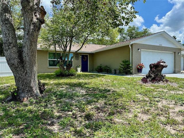 7301 Mitchell Ranch Rd, New Port Richey, FL 34655 - single story home featuring brick siding and a garage
