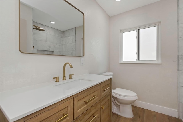 245 Grove Cir N, Dunedin, FL 34698 - bathroom featuring vanity, wood finished floors, a shower, and recessed lighting