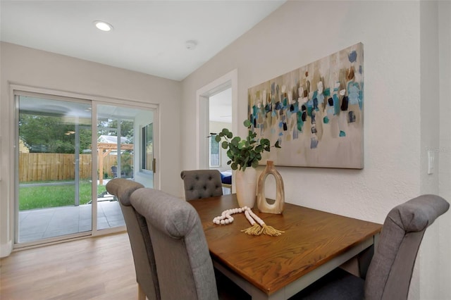 245 Grove Cir N, Dunedin, FL 34698 - dining room with light wood-type flooring and recessed lighting