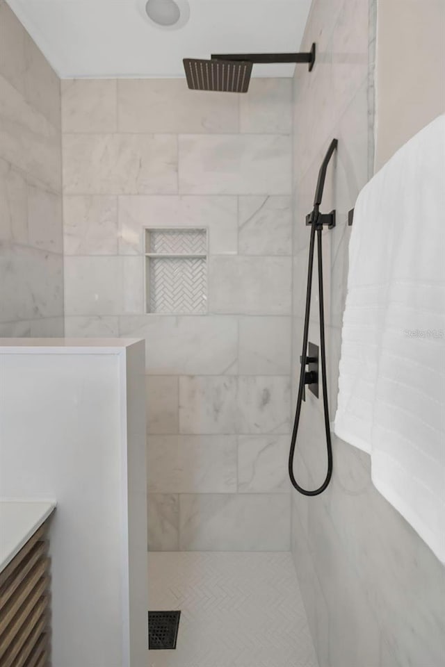 245 Grove Cir N, Dunedin, FL 34698 - full bathroom featuring a walk in shower and vanity