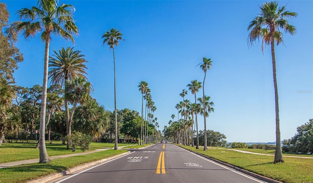 245 Grove Cir N, Dunedin, FL 34698 - view of asphalt road featuring sidewalks