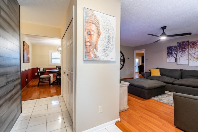 616 Pawn Way, Seffner, FL 33584 - hall featuring a textured ceiling and light tile patterned floors