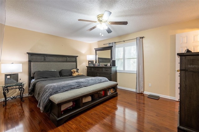 616 Pawn Way, Seffner, FL 33584 - bedroom with wood finished floors, a textured ceiling, and ceiling fan