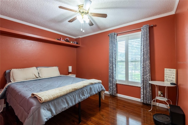616 Pawn Way, Seffner, FL 33584 - bedroom featuring a textured ceiling, wood finished floors, ornamental molding, and a ceiling fan