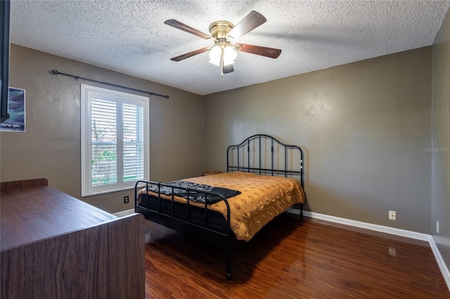 616 Pawn Way, Seffner, FL 33584 - bedroom with wood finished floors, a textured ceiling, and ceiling fan