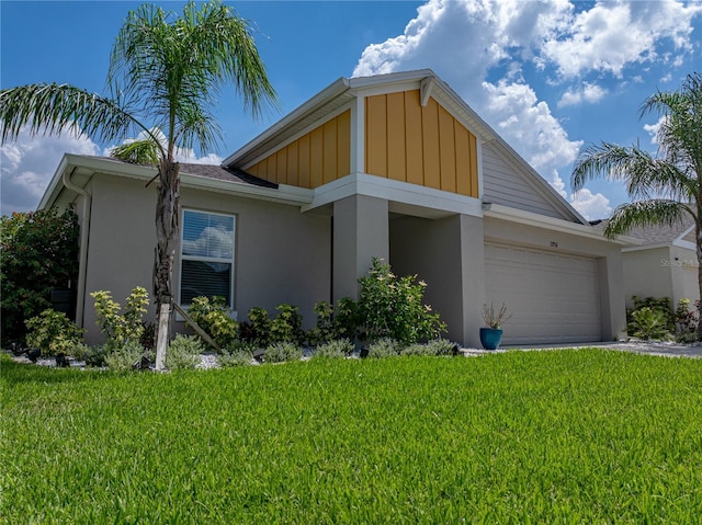 12931 Twin Bridges Dr, Riverview, FL 33579 - view of front facade featuring stucco siding, a front yard, and an attached garage