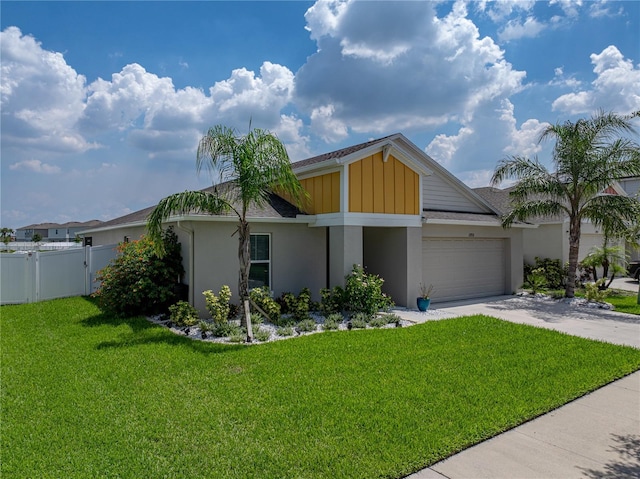 12931 Twin Bridges Dr, Riverview, FL 33579 - view of front of home featuring stucco siding, an attached garage, and driveway