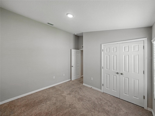 12931 Twin Bridges Dr, Riverview, FL 33579 - unfurnished bedroom with carpet and a closet