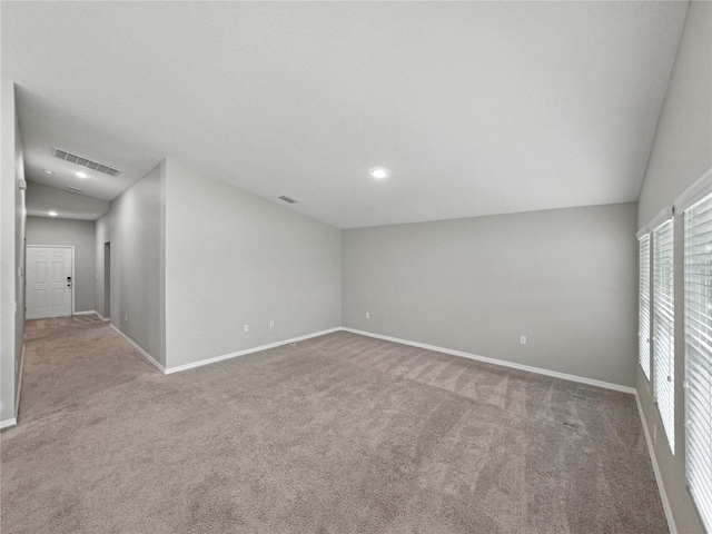 12931 Twin Bridges Dr, Riverview, FL 33579 - empty room with lofted ceiling, carpet flooring, and recessed lighting