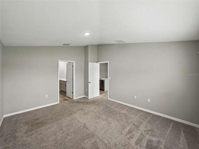 12931 Twin Bridges Dr, Riverview, FL 33579 - spare room with carpet and vaulted ceiling