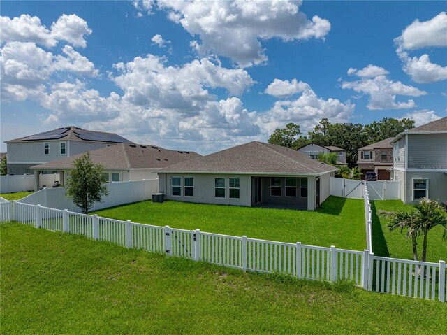 12931 Twin Bridges Dr, Riverview, FL 33579 - back of property featuring a gate, a fenced backyard, and a shingled roof
