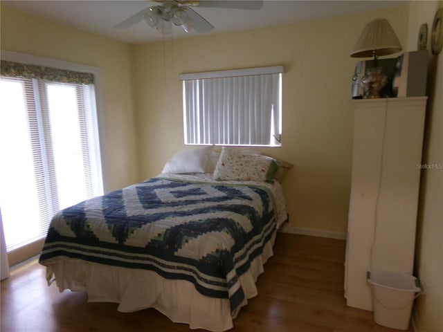2239 Curtis Dr S, Clearwater, FL 33764 - bedroom featuring wood finished floors and ceiling fan