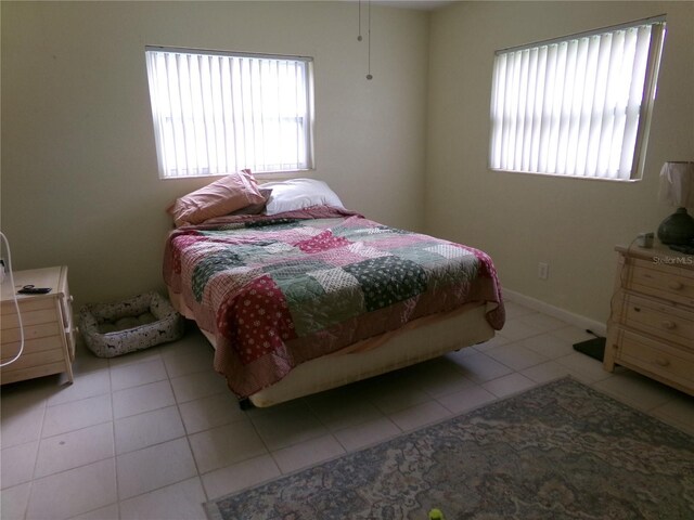 2239 Curtis Dr S, Clearwater, FL 33764 - bedroom with light tile patterned floors