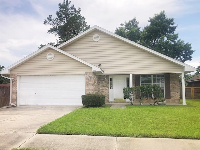 1990 Eclipse Dr, Middleburg, FL 32068 - ranch-style house with a garage, concrete driveway, and brick siding