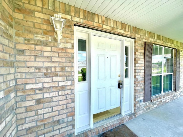1990 Eclipse Dr, Middleburg, FL 32068 - view of exterior entry with brick siding and covered porch