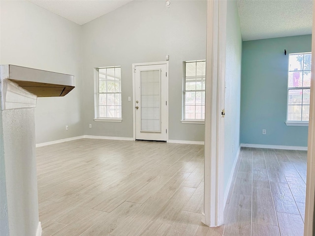 1990 Eclipse Dr, Middleburg, FL 32068 - entrance foyer with light wood-style floors and baseboards