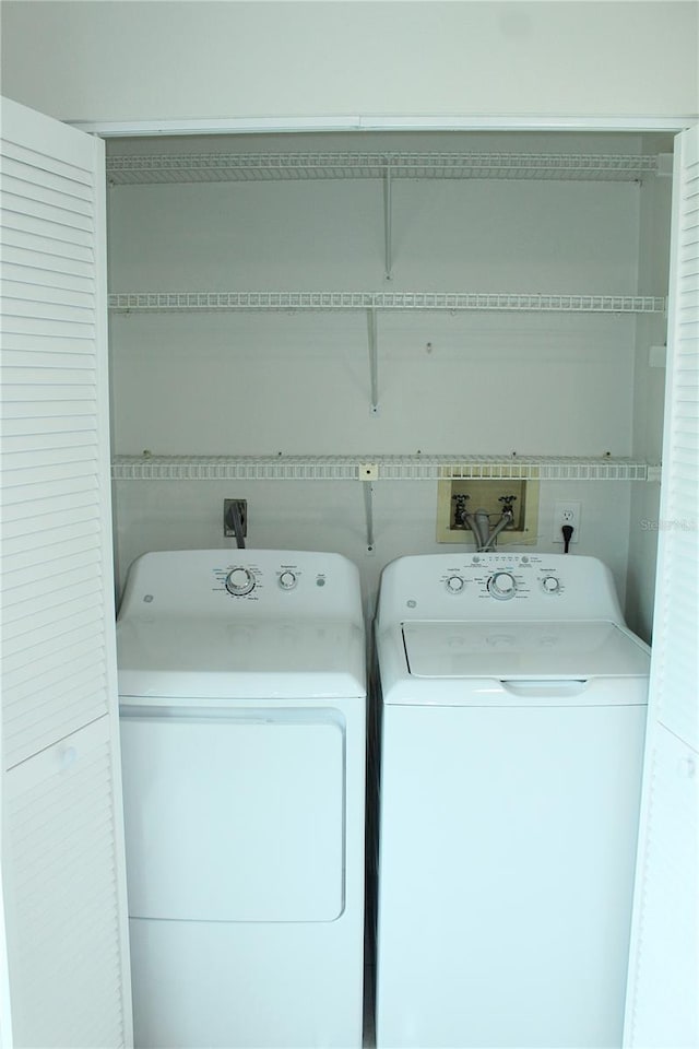 6144 Elmhurst Dr, New Port Richey, FL 34653 - laundry area with independent washer and dryer