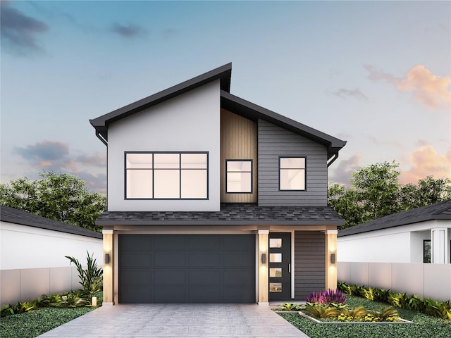 12240 Land St, Largo, FL 33773 - modern home with a garage and driveway