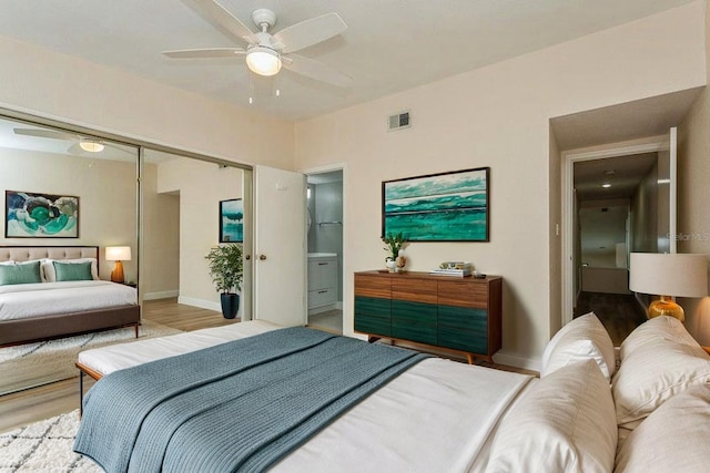 6263 93rd Ter N Unit 4202, Pinellas Park, FL 33782 - bedroom featuring wood finished floors, a closet, and ceiling fan