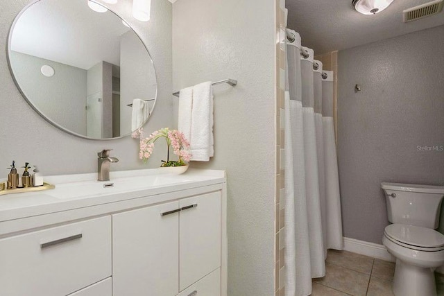 6263 93rd Ter N Unit 4202, Pinellas Park, FL 33782 - bathroom with tile patterned floors, vanity, and curtained shower