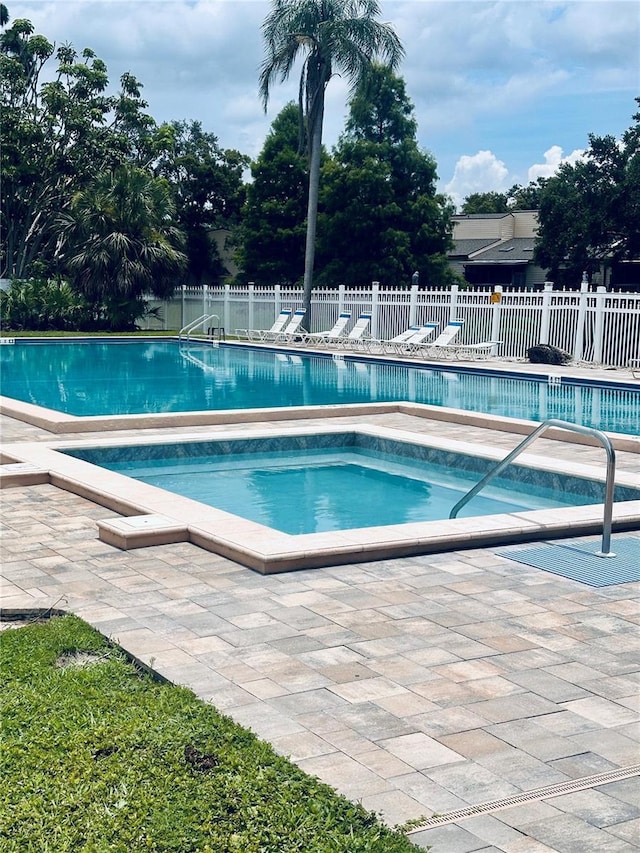 6263 93rd Ter N Unit 4202, Pinellas Park, FL 33782 - community pool with a patio area