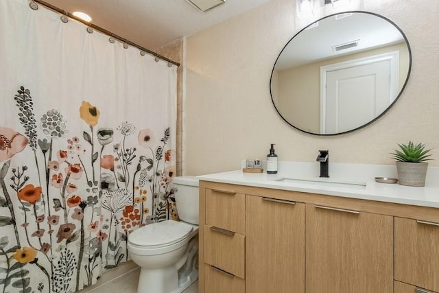 6263 93rd Ter N Unit 4202, Pinellas Park, FL 33782 - bathroom featuring vanity, tile patterned floors, and curtained shower