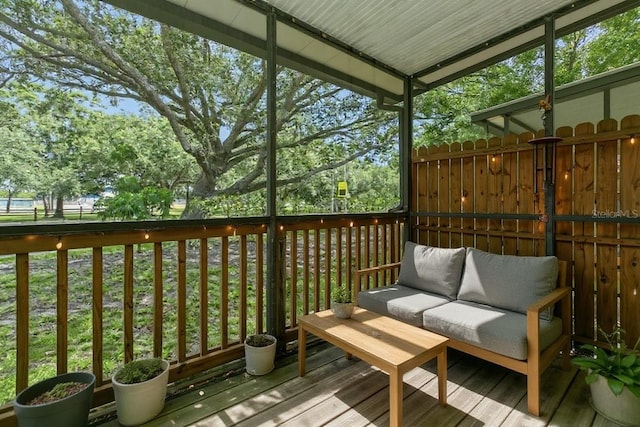 6263 93rd Ter N Unit 4202, Pinellas Park, FL 33782 - wooden terrace with an outdoor living space