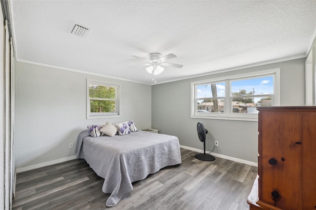 8897 54th St N, Pinellas Park, FL 33782 - bedroom featuring ornamental molding, wood finished floors, and ceiling fan